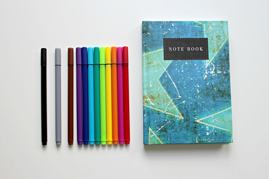 Notebook and pen starter set on desk