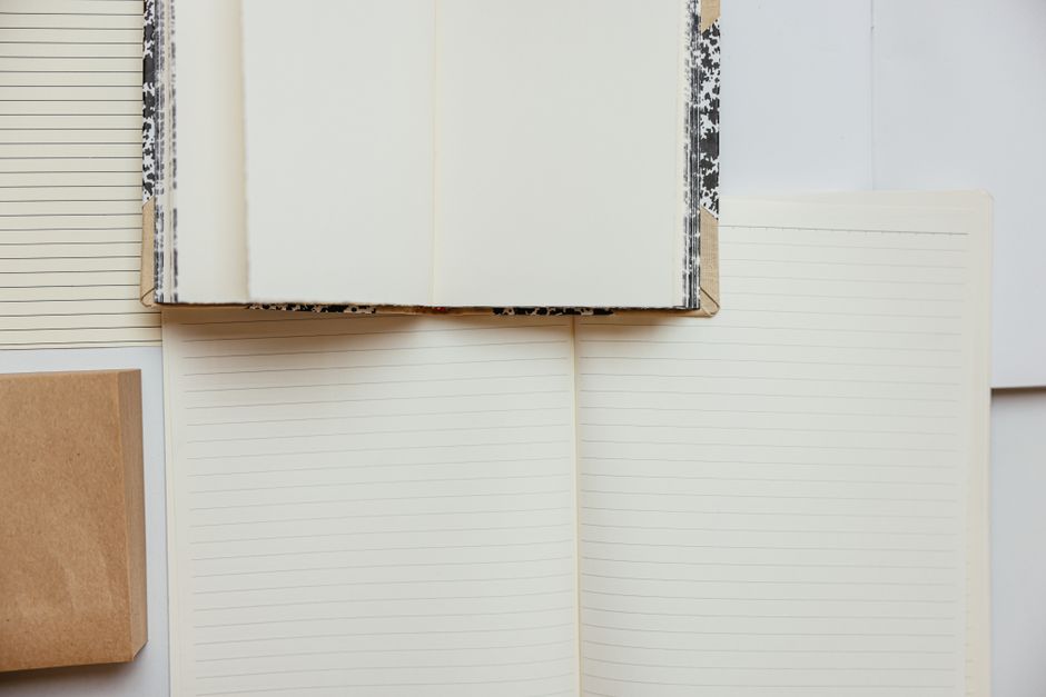 Open notebook with blank pages for writing