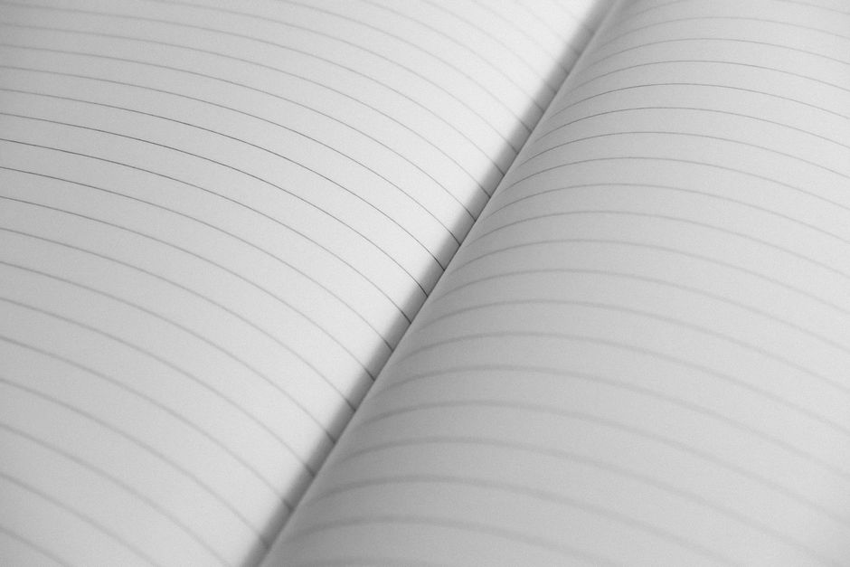 Open notebook pages with writing